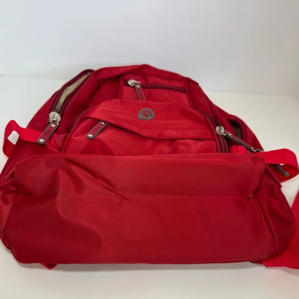 PAQ vibrant red backpack in like new condition